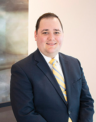 Portrait of Adam N. Froehlich, attorney at Gislason & Hunter